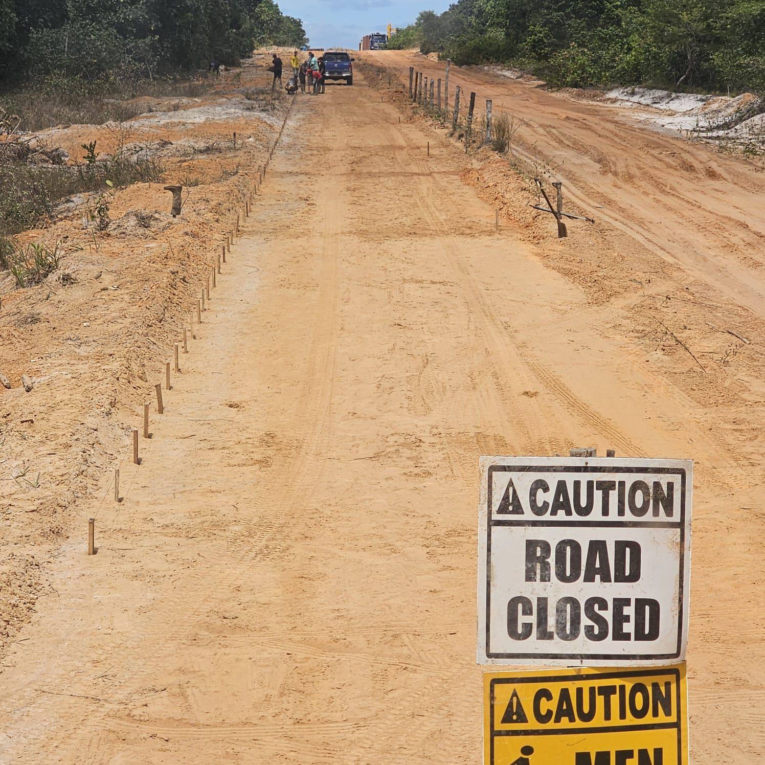 Road closed and set out with stakes for a new alignment